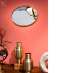 Miroir oval cadre laiton motif lézard