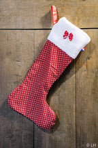 Botte de Noël rouge à pois blancs et son petit nœud