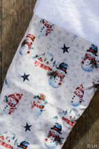 Botte de Noël crème aux motifs bonhommes de neige