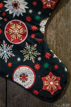 Botte de Noël vert foncé aux motifs étoiles de Noël