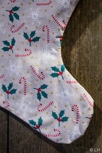 Botte de Noël beige aux motifs houx et sucre d'orge