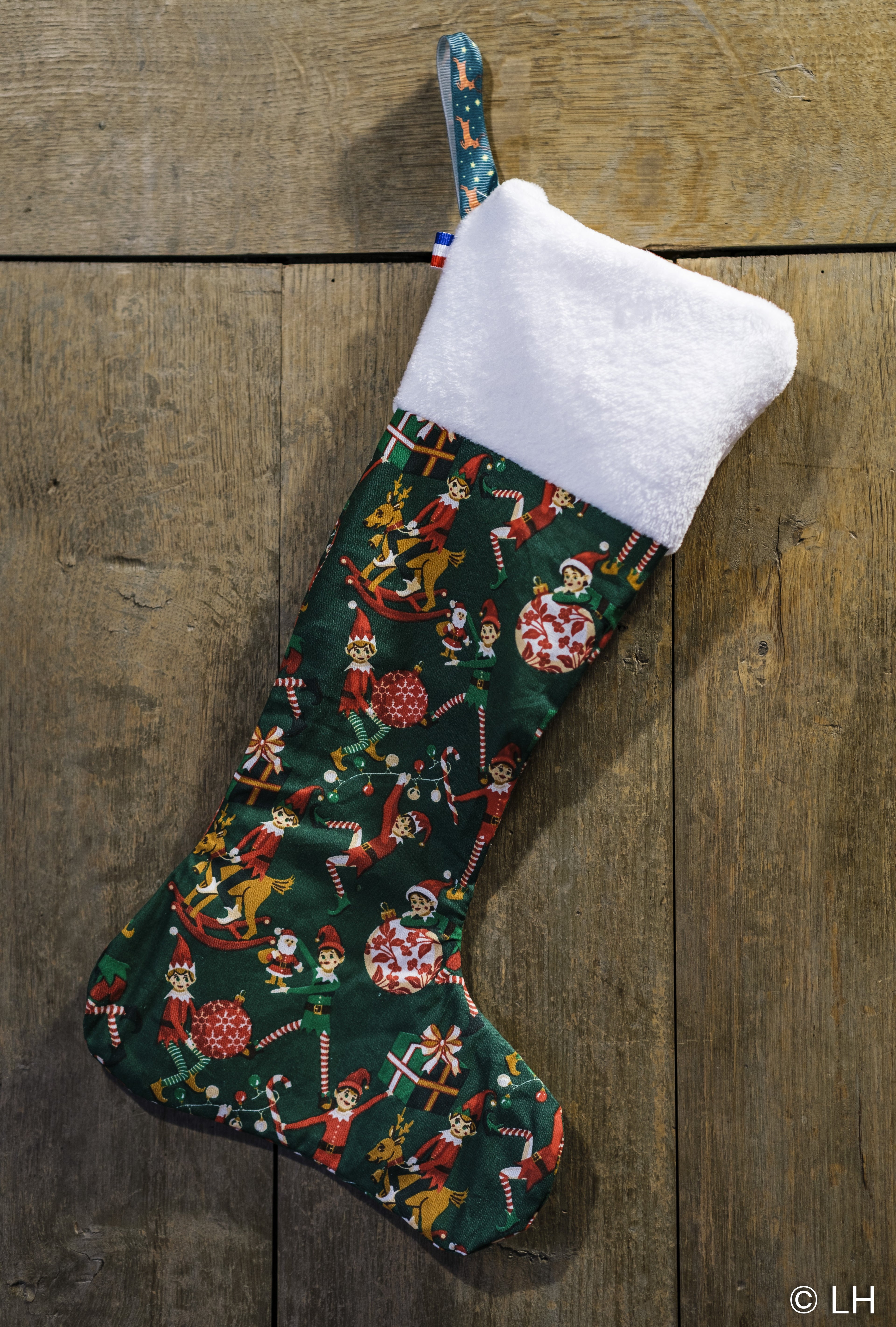 Botte de Noël vert foncé aux motifs petits lutins