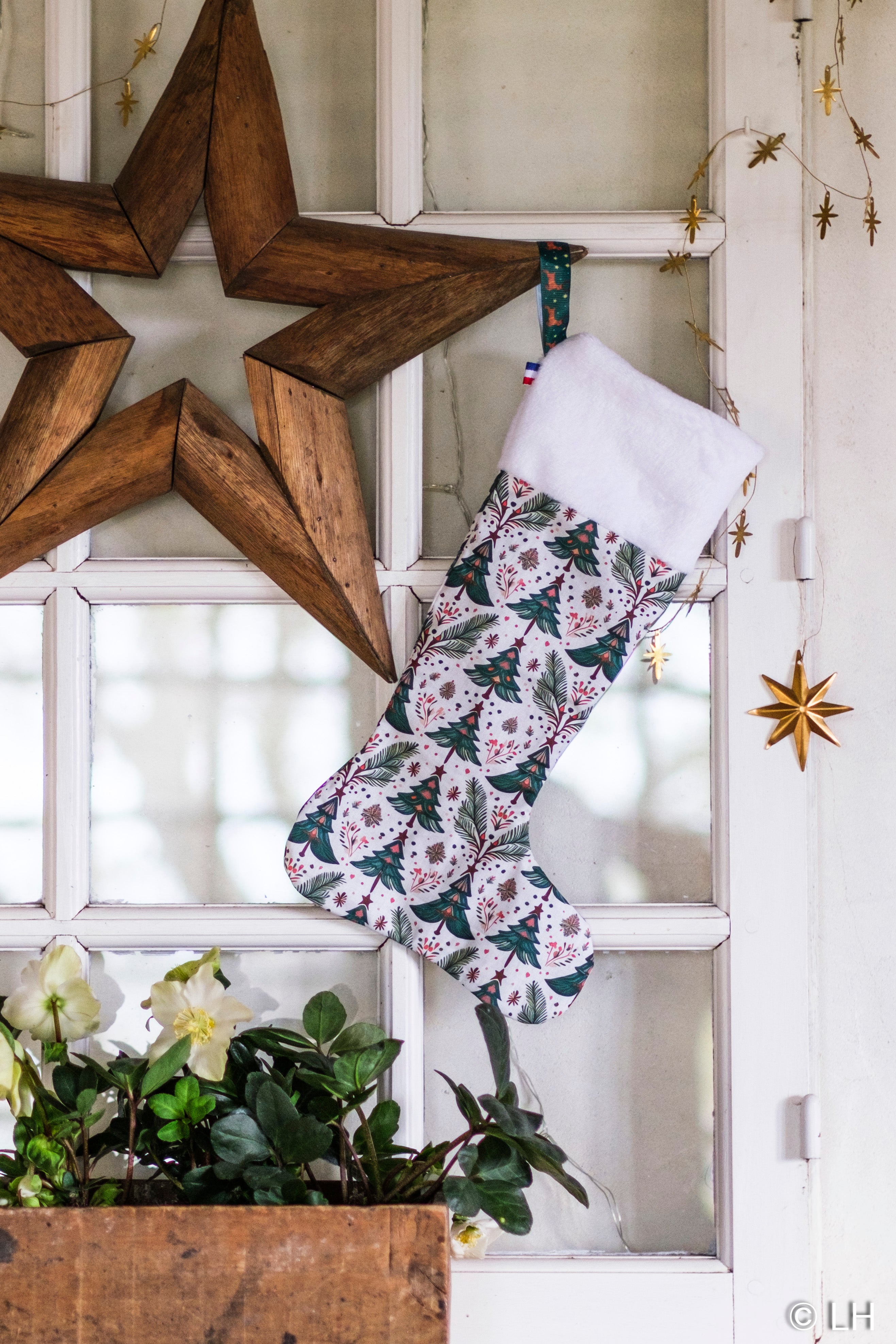 Botte de Noël blanche aux motifs sapins de Noël
