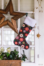 Botte de Noël vert foncé aux motifs étoiles de Noël