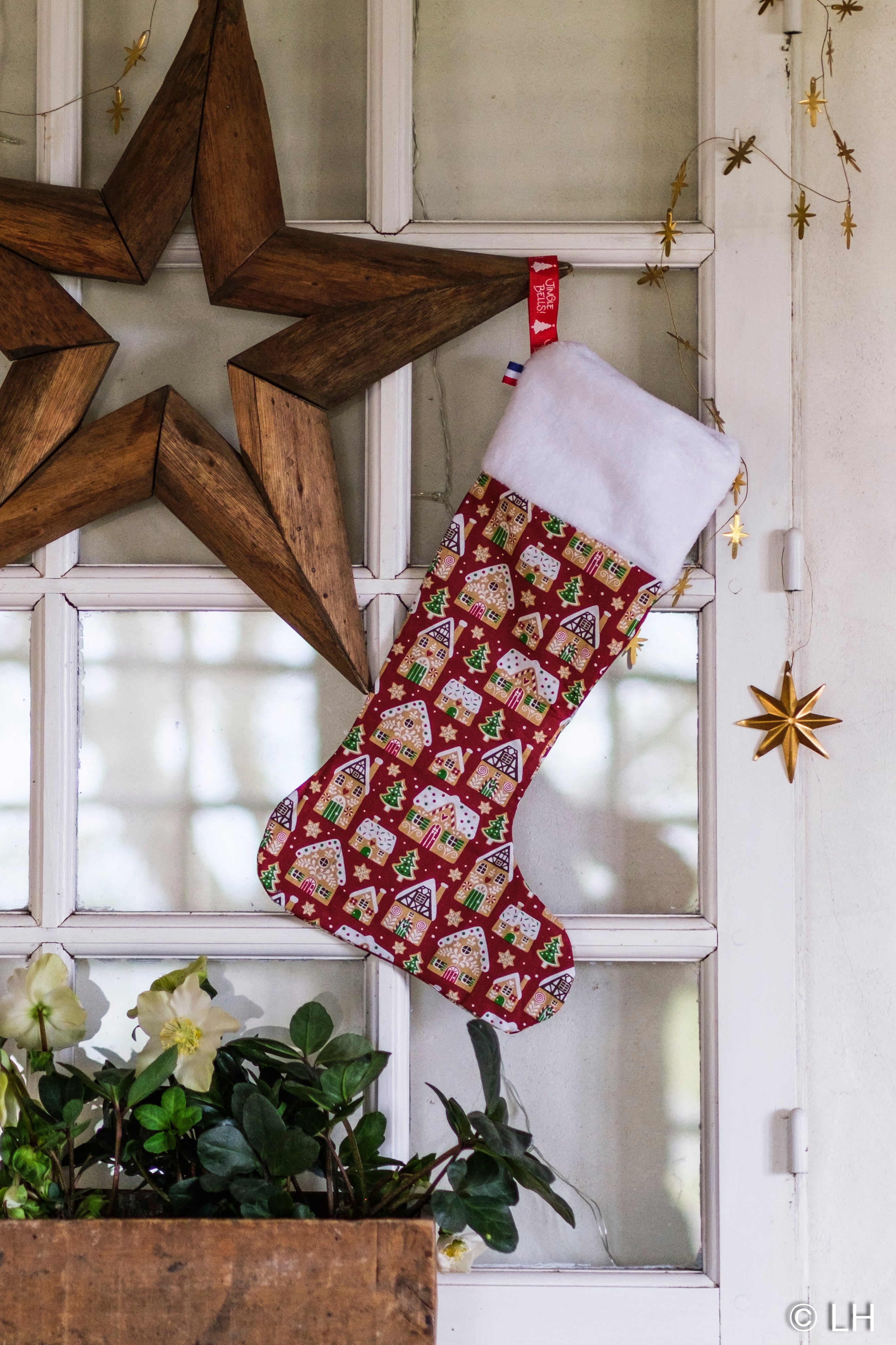 Botte de Noël aux motifs maisonnettes en pain d'épices