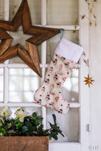 Botte de Noël crème aux motifs bonhommes de neige