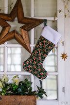 Botte de Noël vert foncé aux motifs petit houx et arabesques