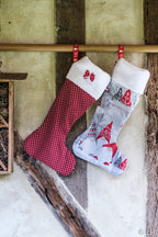 Botte de Noël rouge à pois blancs et son petit nœud