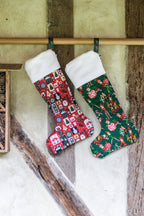 Botte de Noël vert foncé aux motifs petits lutins
