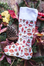 Botte de Noël blanche aux motifs décorations de Noël