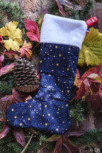 Botte de Noël bleu profond aux motifs étoiles dorées