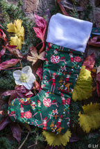 Botte de Noël vert foncé aux motifs petits lutins