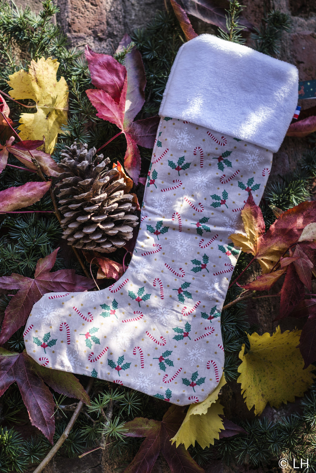 Botte de Noël beige aux motifs houx et sucre d'orge