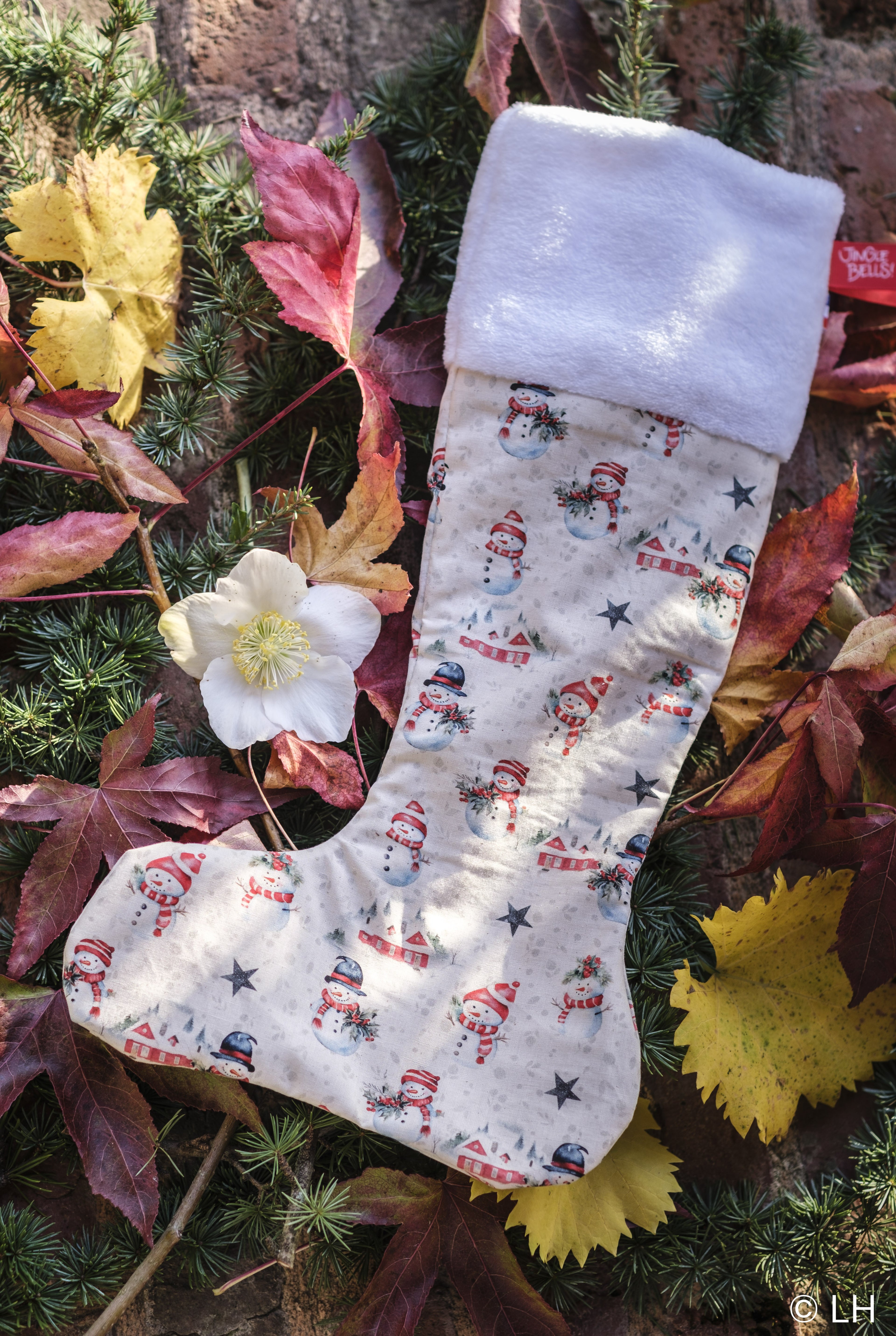 Botte de Noël crème aux motifs bonhommes de neige